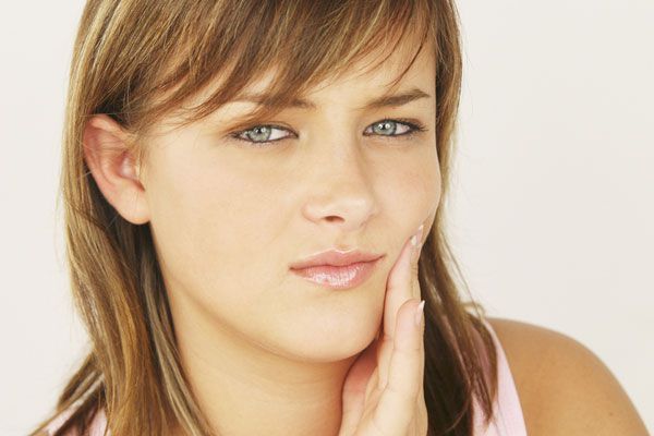 Заболевания пародонта могут вызывать болезненные ощущения